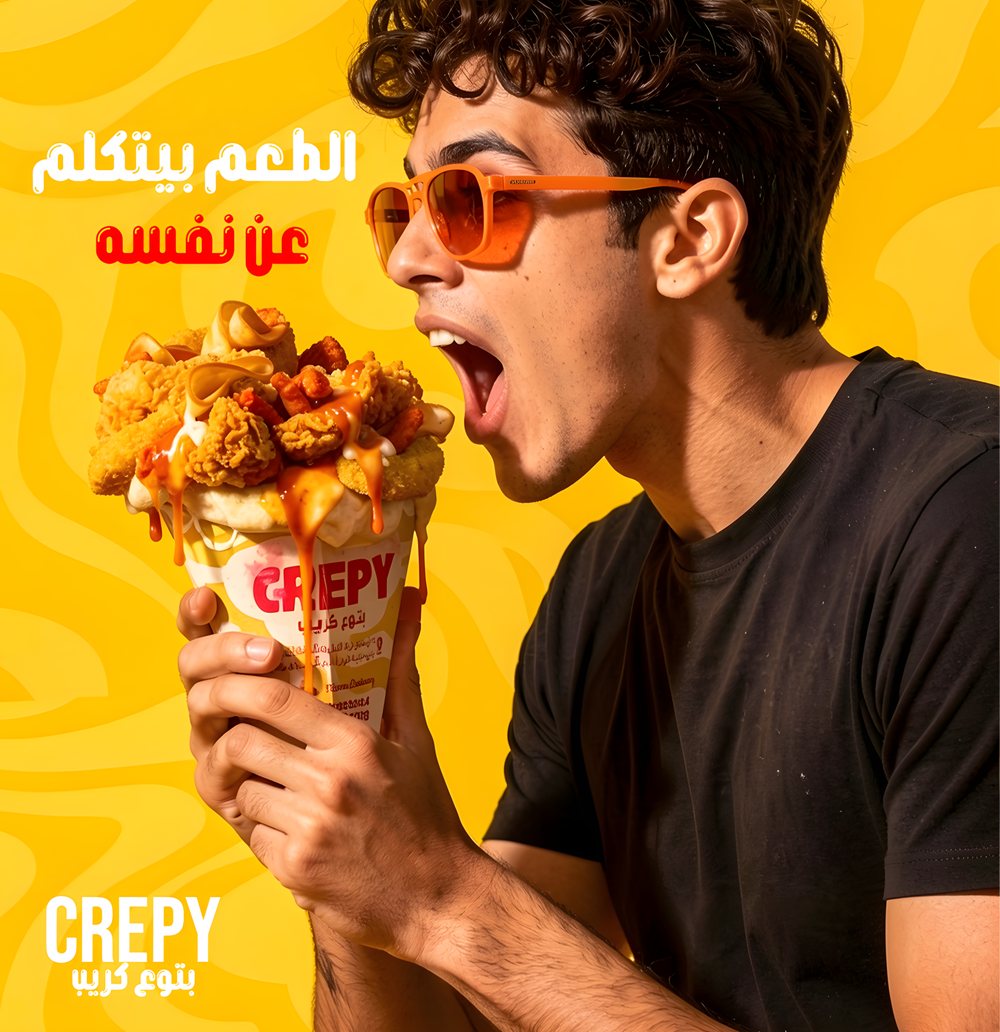 Crepy campaign hero: model about to bite a loaded crepe cone on yellow